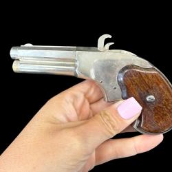 EXTRAORDINAIRE PISTOLET REMINGTON RIDER MAGAZINE cal. 32RF num&eacute;ro de s&eacute;rie E207