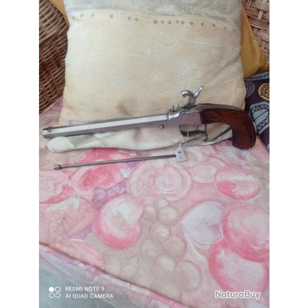 Pistolet de tir a percussion