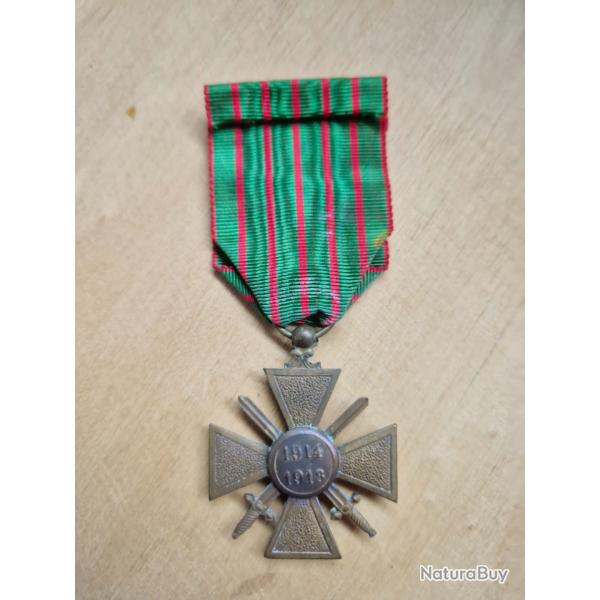 Croix de guerre avec palme.