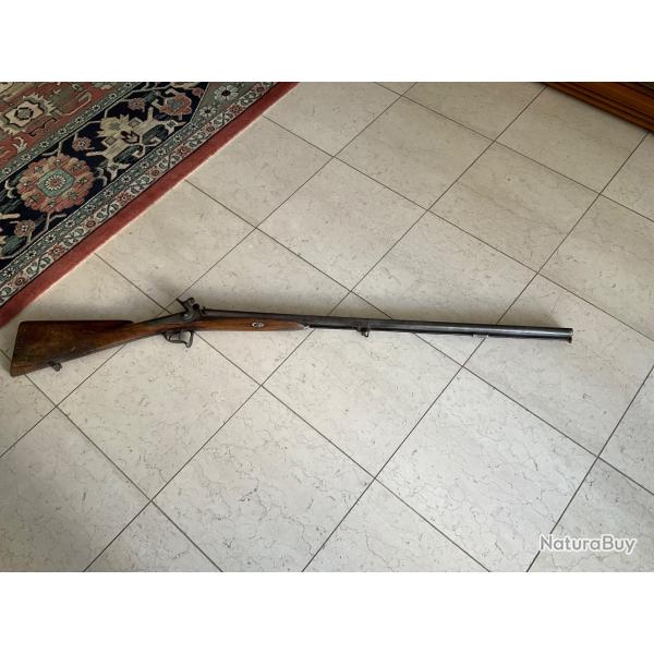 Vent, fusil de chasse tr�s ancien.
