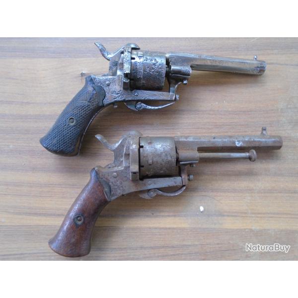 2 REVOLVERS A BROCHE