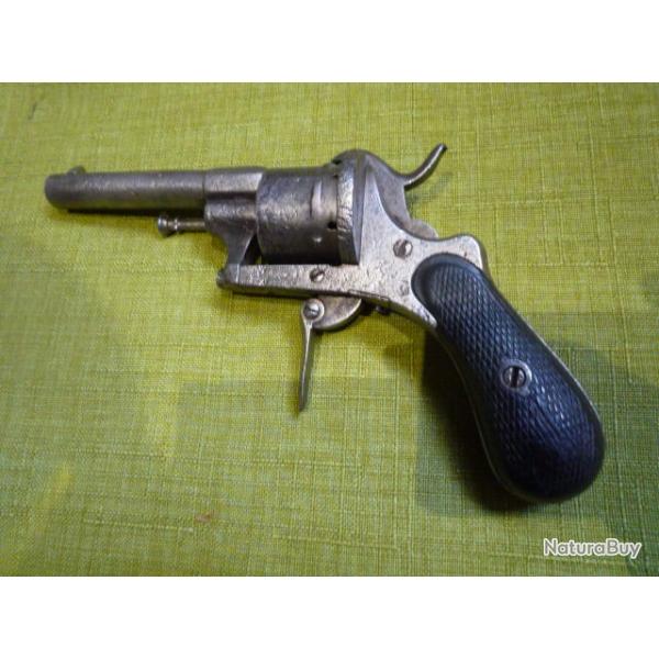 �pave de revolver a broche