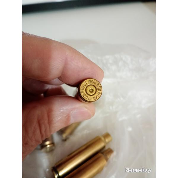 1 lot de 9 etuis en cal 30 284 Winchester.
