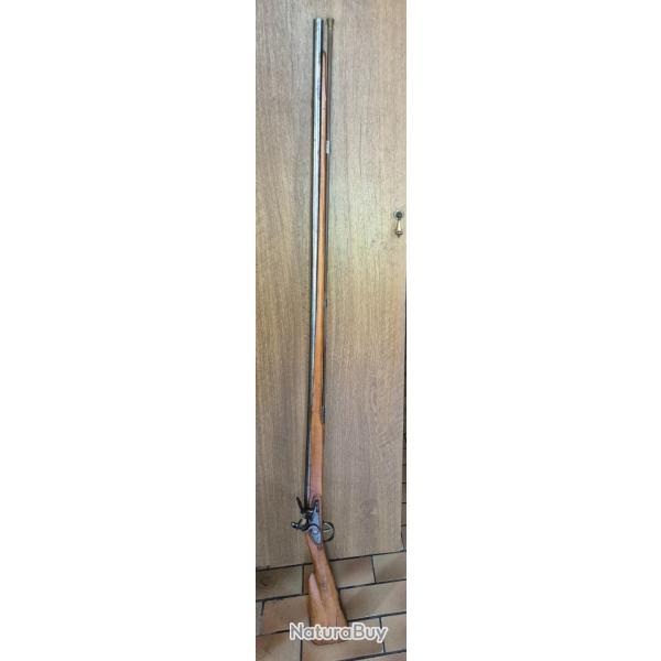 Fusil 1 coup.a silex tr�s bon �tat de presention.et de fonctionnement a �t� restaurer anciennement .