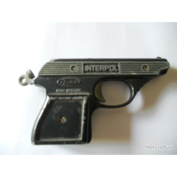 pistolet jouet interpol dans son jus pour collection je ne sais pas si fonctionne