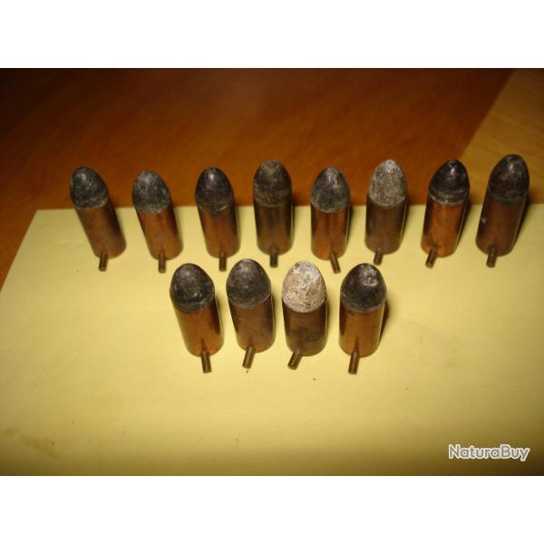 Lot de 12 cartouches anciennes de cal 7mm � broche