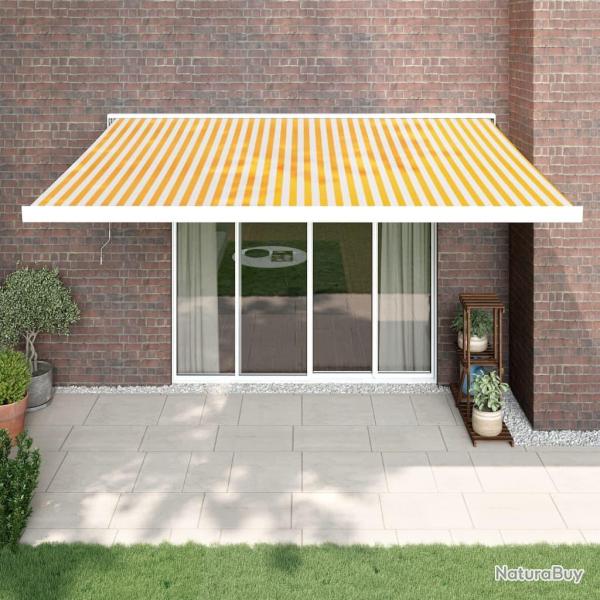 Auvent r�tractable jaune et blanc en tissu et aluminium pour la terrasse, 4,5 � 3 m