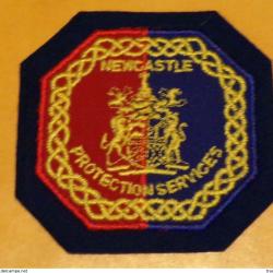 ECUSSON TISSU :&nbsp;AFRIQUE DU SUD&nbsp;:&nbsp;NEWCASTLE PROTECTION SERVICES,&nbsp;ETAT VOIR PHOTO&nbsp; . POUR TOUT RENSEIG