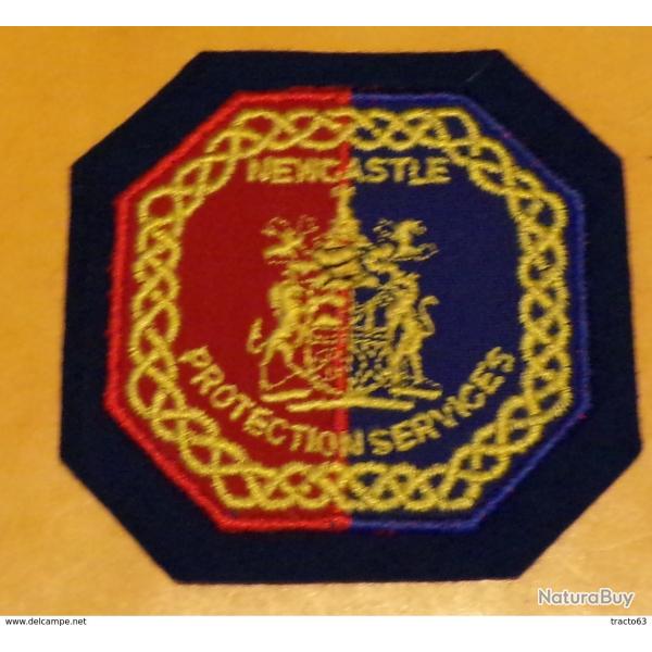 ECUSSON TISSU :�AFRIQUE DU SUD�:�NEWCASTLE PROTECTION SERVICES,�ETAT VOIR PHOTO� . POUR TOUT RENSEIG