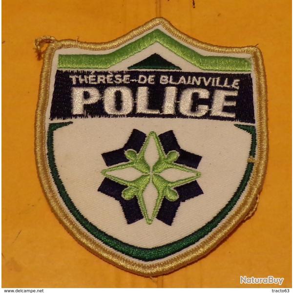 ECUSSON TISSU :�CANADA : POLICE VILLE DE�THERESE DE BLAINVILLE ,�ETAT VOIR PHOTO� . POUR TOUT RENSEI