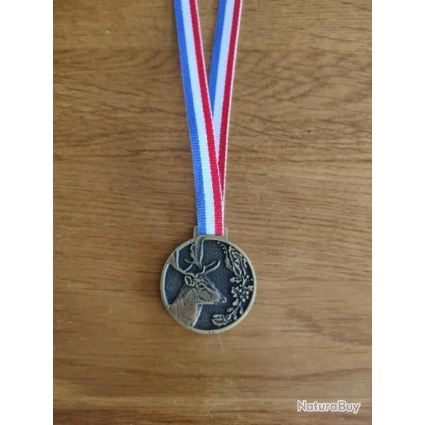 M�daille cotation troph�e daim �chelon or