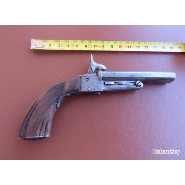 petit pistolet a percussion deux coups ressort chien droit hs gauche ok