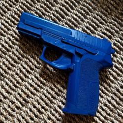 Pistolet d'entrainement SP2022 Ring's Poids R&eacute;el