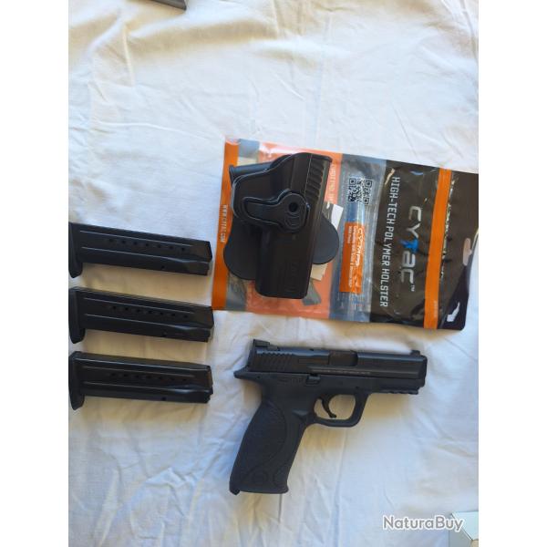 vend , pistolet SMITH  WESSON  MP 9 , arme tres bon etat  + 3 chargeurs + holster pour MP 9 .