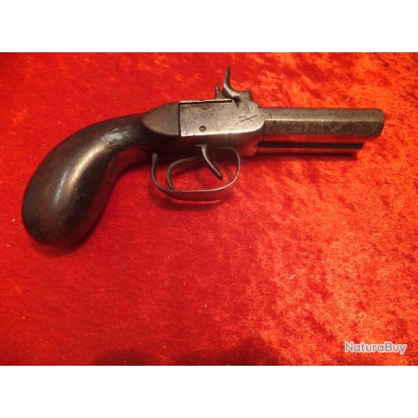 Pistolet de poche � percussion, � deux coups, �poque Louis-Philippe, en bon �tat g�n�ral.