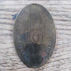 Plaque garde particulier La Loi