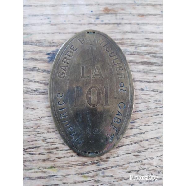 Plaque garde particulier La Loi