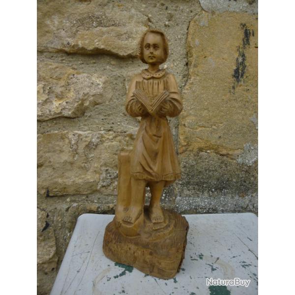 Sculpture en bois d'olivier ou buis Jeune homme � la lecture