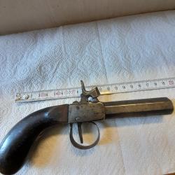 Pistolet coup de poing &agrave; percussion