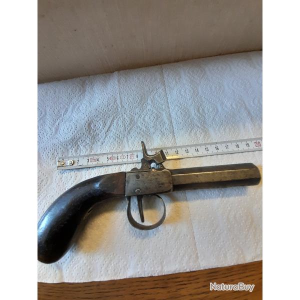 Pistolet coup de poing � percussion