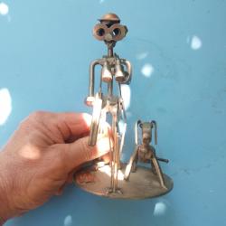 sculpture chasseur et son chien en acier HINZ & kunst