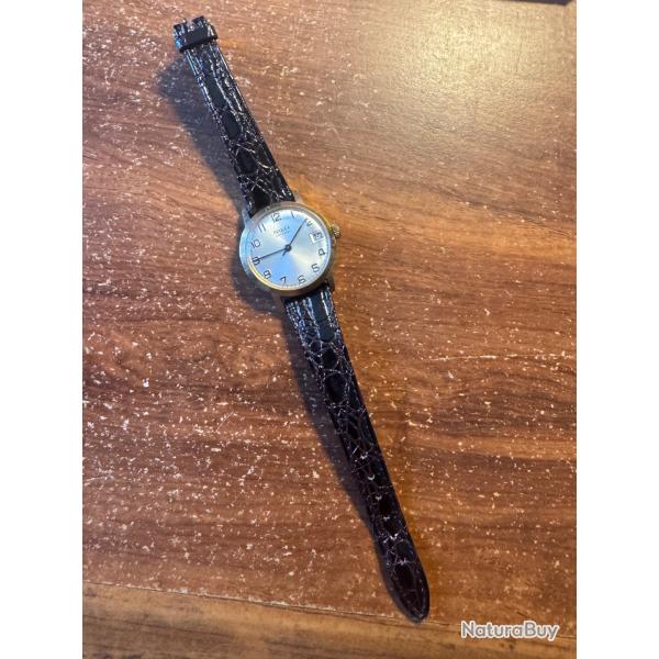 Montre mixte m�canique Reglex parfaitement fonctionnelle