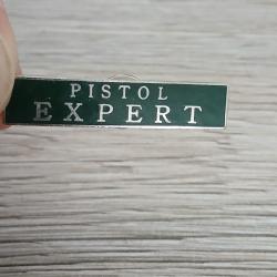 Pin's pistol expert