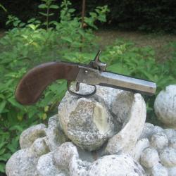 pistolet a coffre