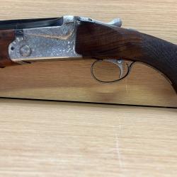 Fusil superpos&eacute;, calibre  12/70, SKB Arms.