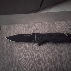 Couteau avec brise vitre et coupe ceinture