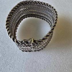 Spectaculaire bracelet d'argent tress&eacute;