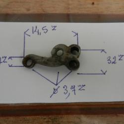une ancienne bride de noix pour ancien fusil