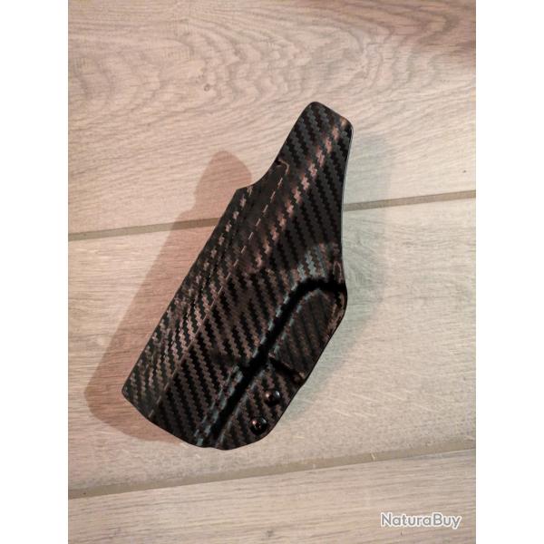 Holster port discret