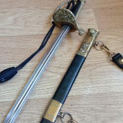 Sabre d'officier de la Marine Nationale  nominatif,fab Hostin avec dragonne,b&eacute;li&egrave;res