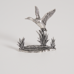 Figurine canard en vol