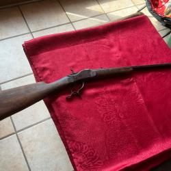 Carabine ancienne &agrave; chien ext&eacute;rieur et bloc basculant de marque Rivolier en 22 bosquette et 6 mm
