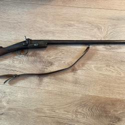 Fusil de braconnier pliant &agrave; un coup, calibre 20, syst&egrave;me &agrave; broche ; tr&egrave;s bon &eacute;tat d'origine.