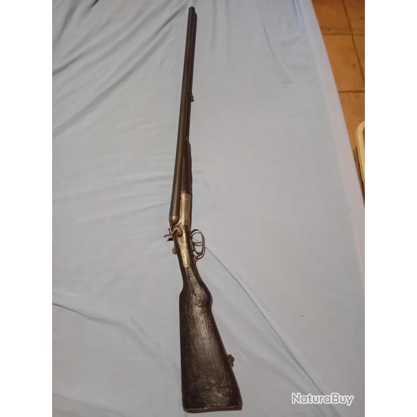 Fusil de collection chiens ext�rieurs percu centrale cal 12