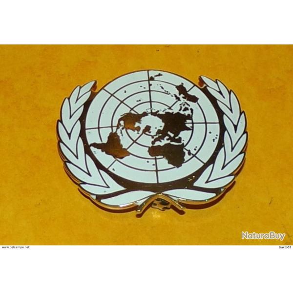 NATIONS UNIES, Insigne de B�ret, �mail, FABRICANT MMI IRELAND�,HOMOLOGATION SANS,�ETAT VOIR PHOTO� .