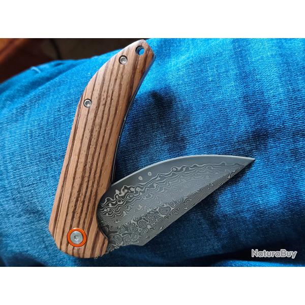 Vends couteau neuf manche bois, acier damas v�ritable ,21 cm ouvert, 9,5 cm de lame