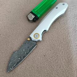 Vends couteau 19cm ouvert, manche alu, lame damas, neuf, horla