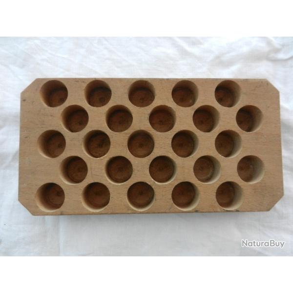 plaque en bois outil de rechargement pour cartouches de 20mm.