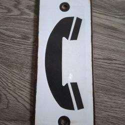 Plaque en t&ocirc;le &eacute;maill&eacute;e 10 cm x 24 cm  pr&eacute;sentant un t&eacute;l&eacute;phone. Pour batiment militaire ?