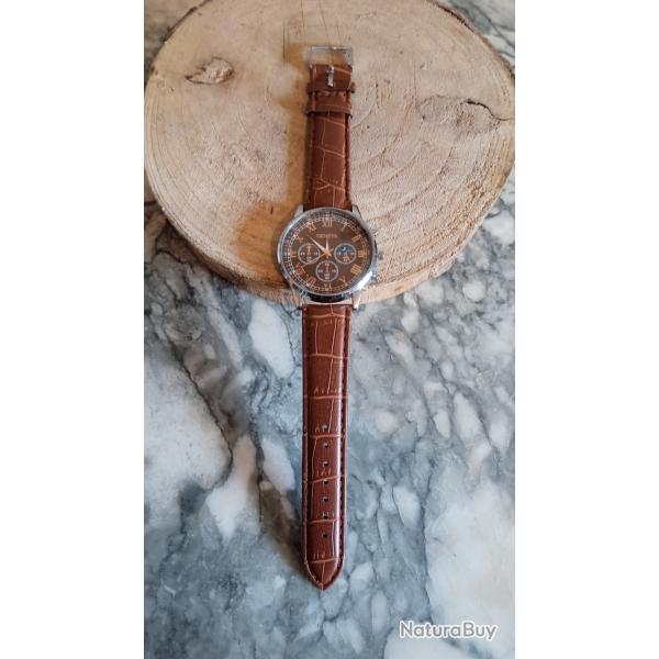 Joli montre bracelet cuir marron + pile neuf livraison GRATUITE avec envol en lettre verte