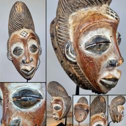 Masque de c&eacute;r&eacute;monie Punu Okuyi vendu sans socle, H : 28 cm, L : 13 cm