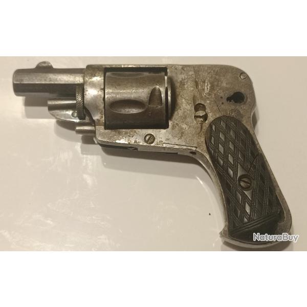 REVOLVER HAMMERLESS Cal. 320 bulldog.