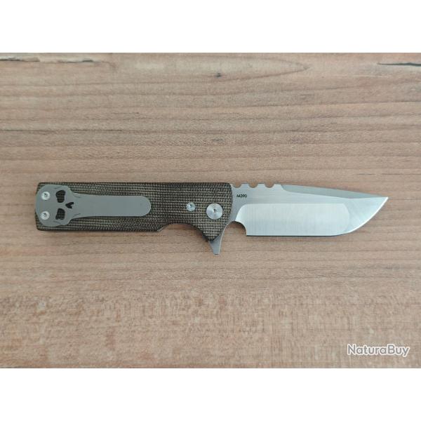 Chaves T.A.K. lame drop point en M390, et plaquettes en Micarta.