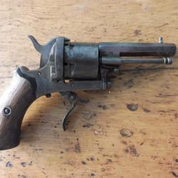 revolver broche 7mm poudre noire petit probleme sur le ressort de detente