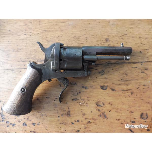revolver broche 7mm poudre noire petit probleme sur le ressort de detente