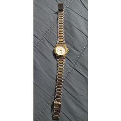 Vend montre lenoir quartz pour femme